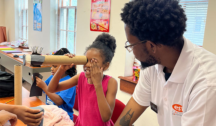 Teacher working with a student