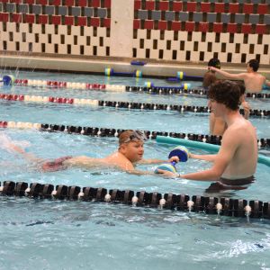 student swimming