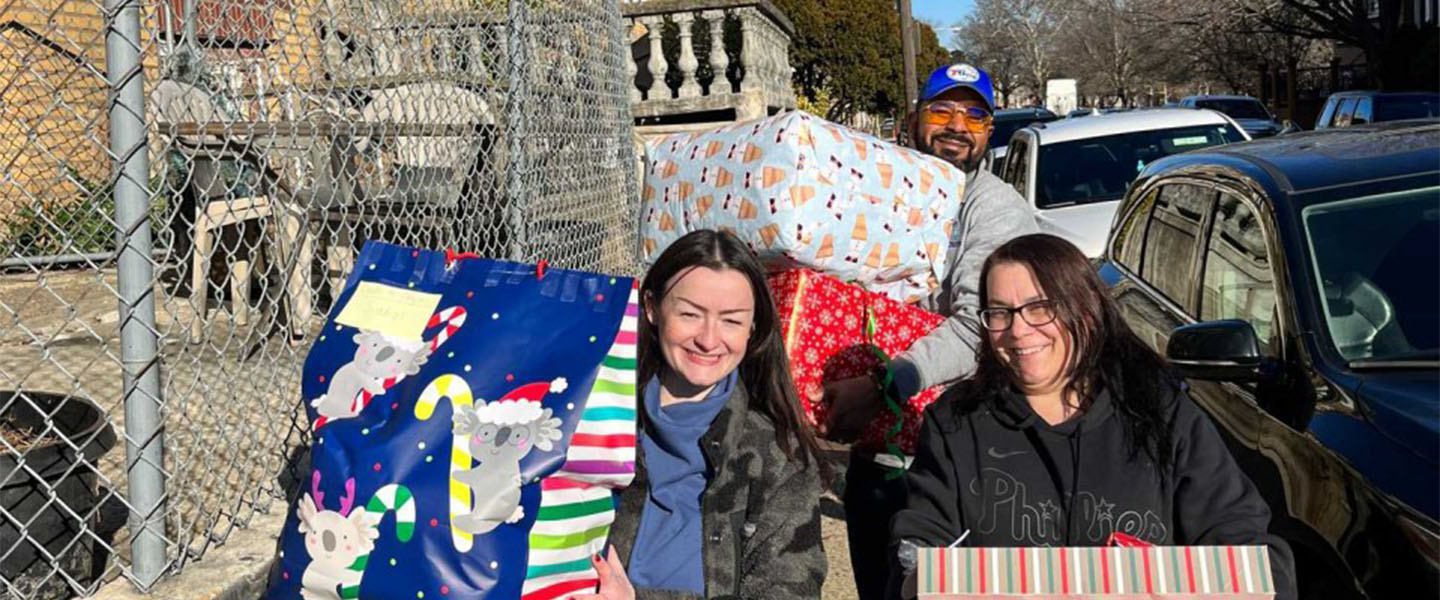 Volunteers delivering Christmas gifts