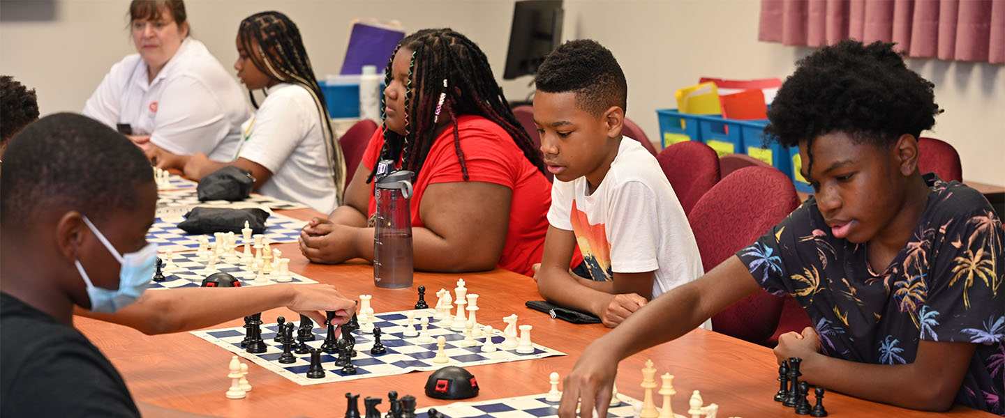 Students playing chess