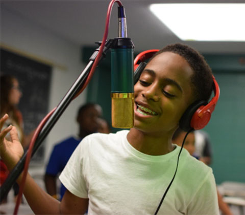 Singing in the music studio