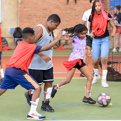 Campers playing soccer